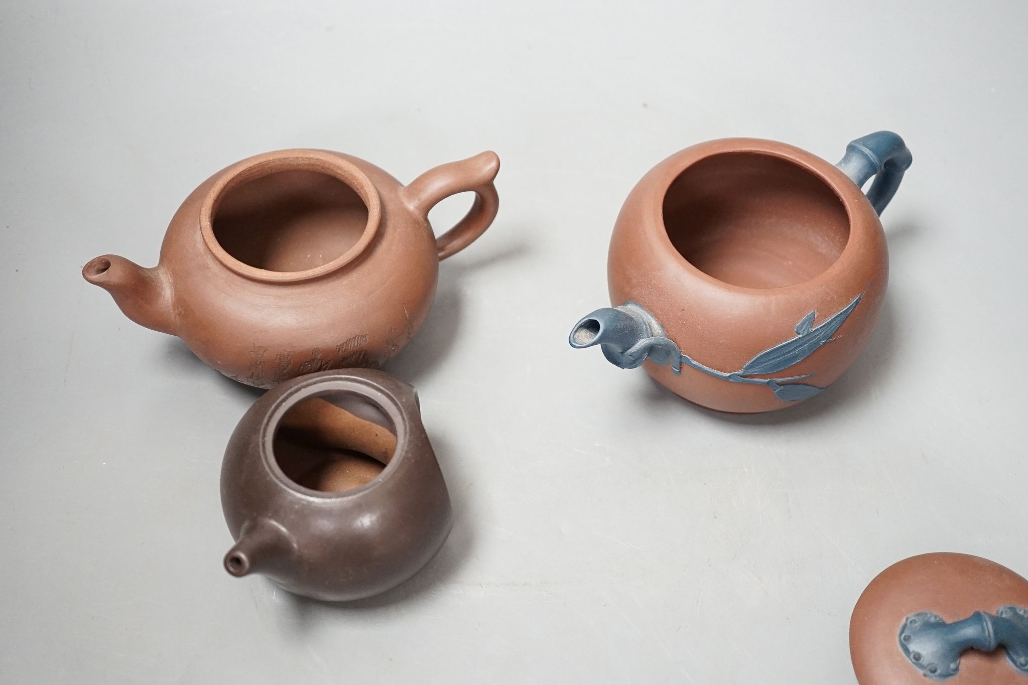 Three Chinese Yixing teapots, tallest 10cm